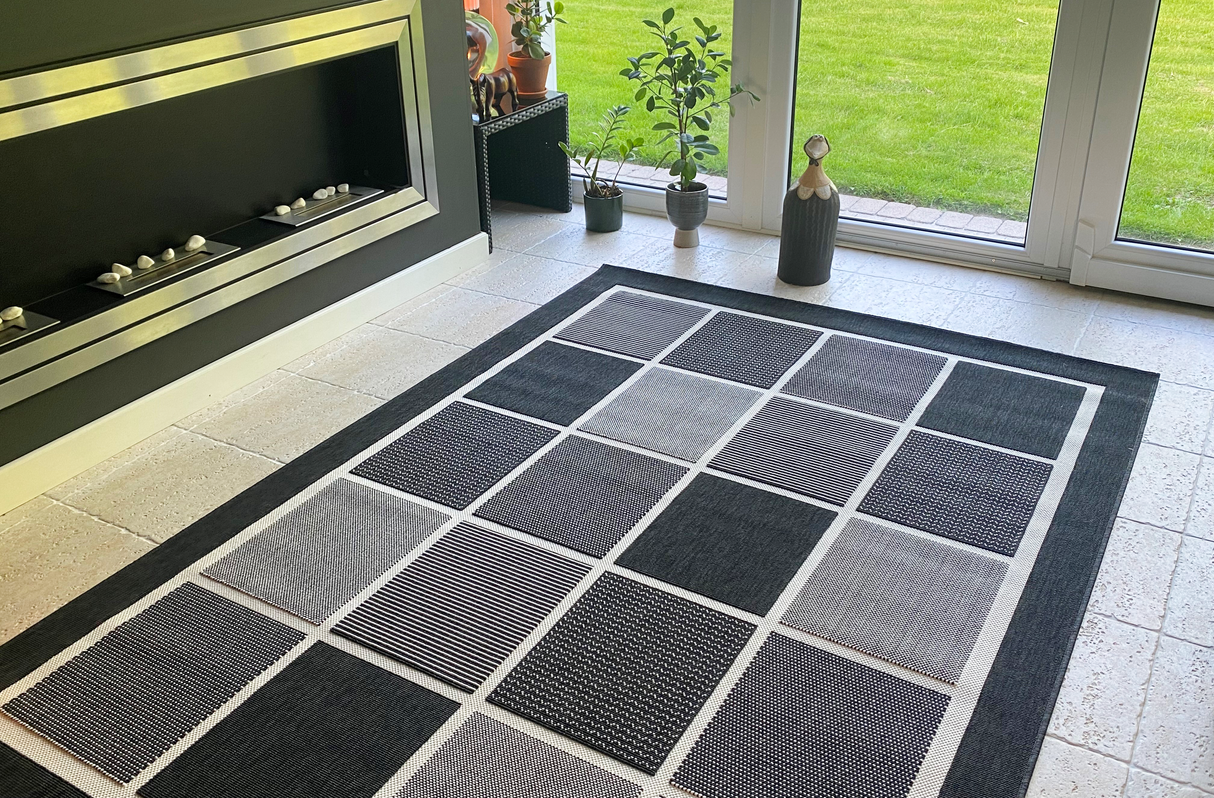 Fenix Polytuft fladvævet tæppe Black